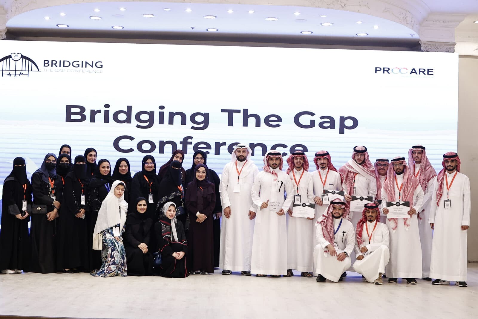 The delegates of Bridging the Gap 12 gathered on stage for the closing group photo
